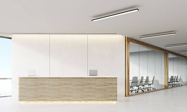 istock Front view of reception counter in office 619736216