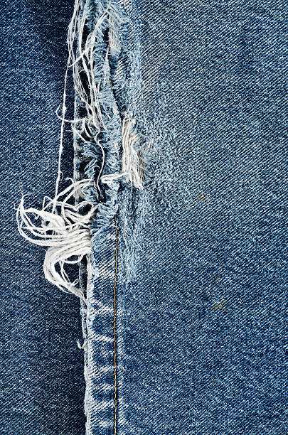 istock .Denim jeans texture or denim jeans background with old torn. 619736540