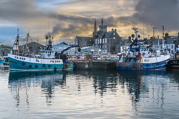 Mallaig, UK-19 June 2024; Various colorful fishing boats moored in the harbor of the city known for its fishing industry