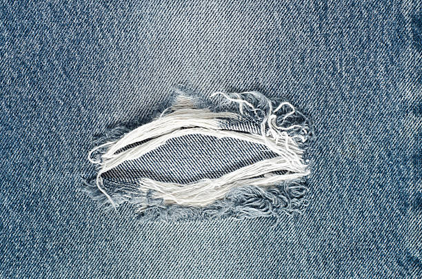 istock .Denim jeans texture or denim jeans background with old torn. 619736940