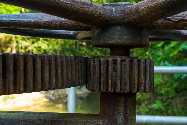 istock Old Cog wheels to drive water gate. 619737380