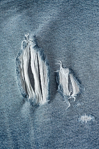 istock .Denim jeans texture or denim jeans background with old torn. 619737712