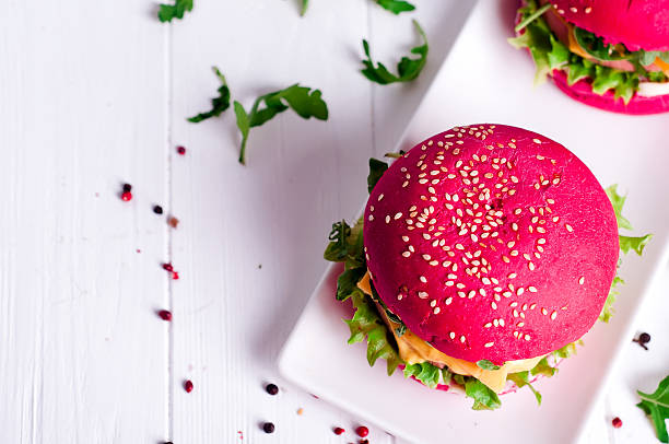 Tasty burger with, sausage, lettuce and mayonnaise served on a