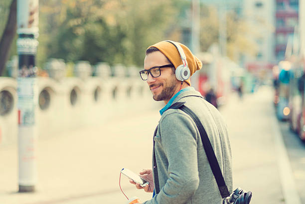 istock handsome man listening music 619739986