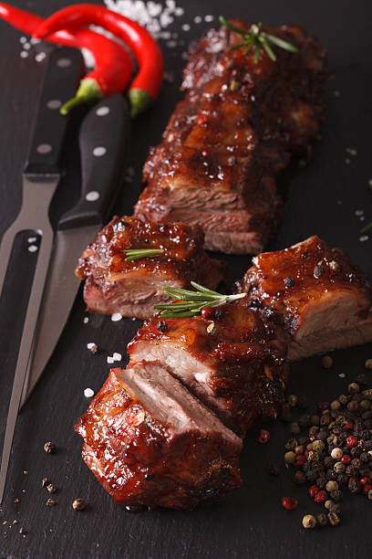 istock BBQ pork ribs sliced on the table with the ingredients 619741254