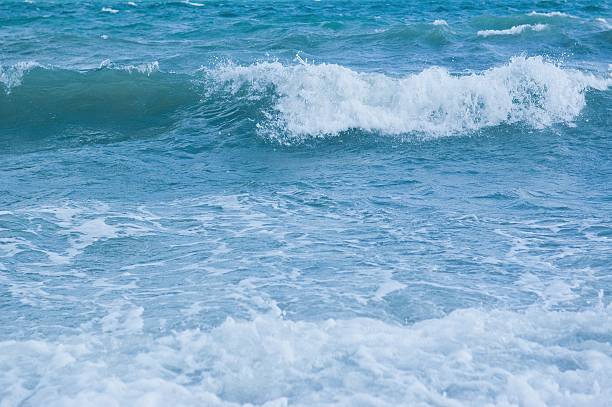 istock Splashing waves on the sea 619741666
