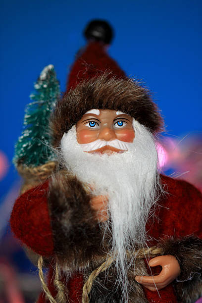 istock Santa Claus with with Christmas tree 619741920