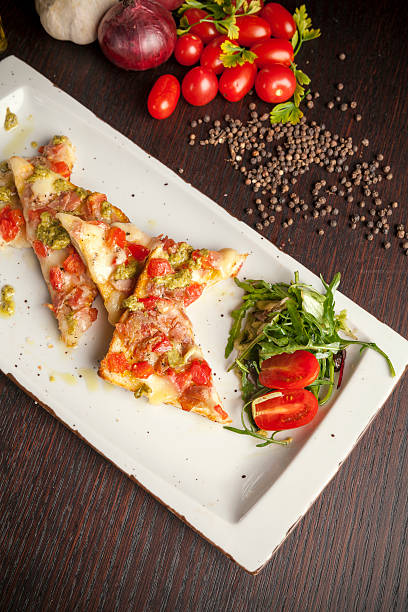 istock bruschetta with pesto sauce and arugula 619741986