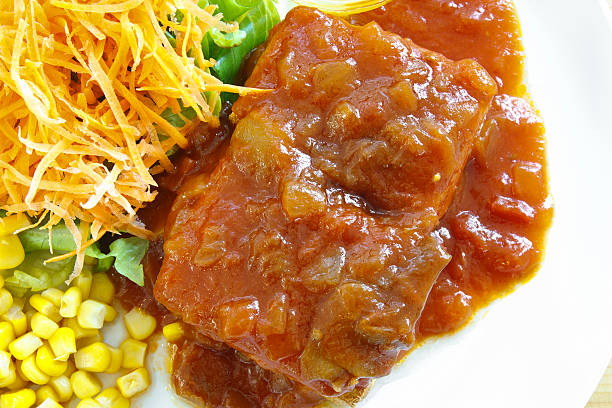 istock tofu steak for vegetarian with sauce, carrot, corn and vegetable 619743614