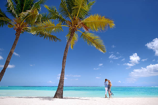 Young couple on a tropical island stock photo