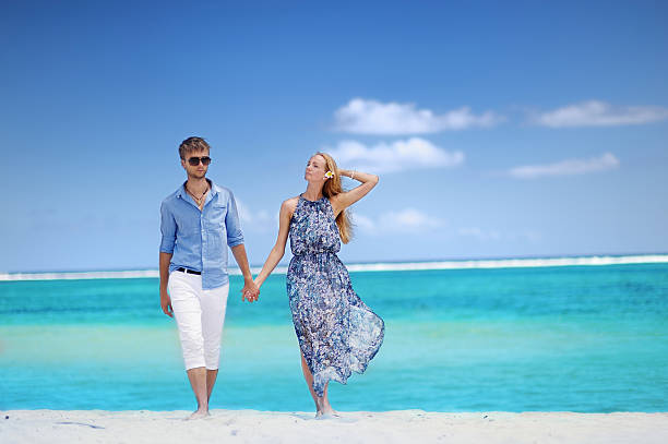 Young beautiful couple on a tropical island
