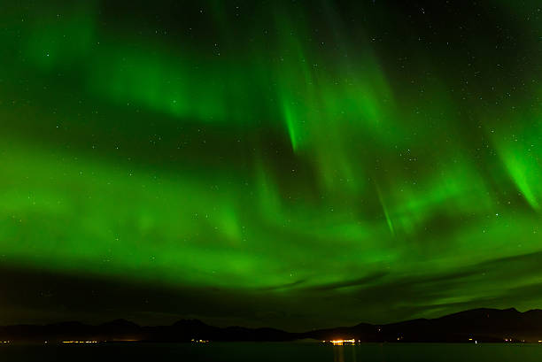istock Aurora borealis or northern lights at Tromso, Norway 619750686