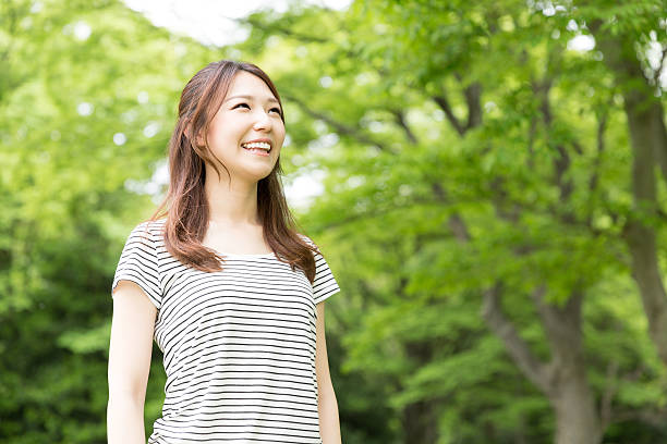 istock Woman standing outside 619750988