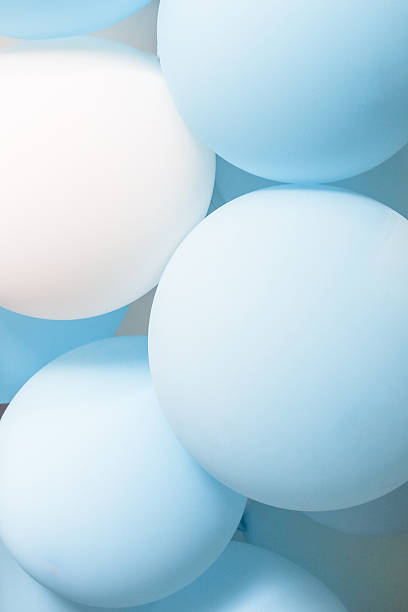 istock blue white party balloon texture close up 619753554