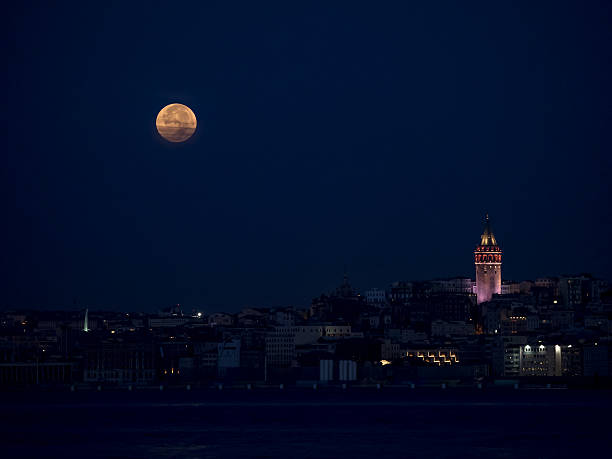 Full Moon Full moon in İstanbul galata tower photos stock pictures, royalty-free photos & images
