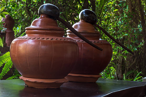 istock Closed up Thai traditional earthenware for drinking water with d 619756176
