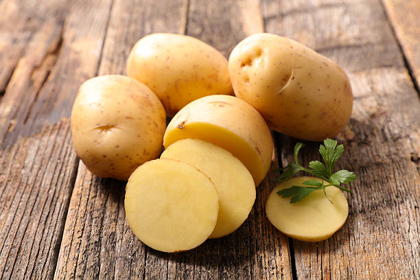 raw potato raw potato raw potato stock pictures, royalty-free photos & images