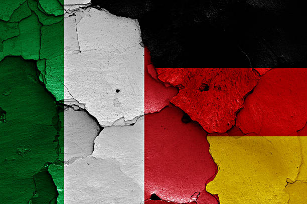 istock flags of Italy and Germany painted on cracked wall 619757576