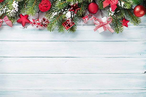 istock Christmas background with snow fir tree 619757872