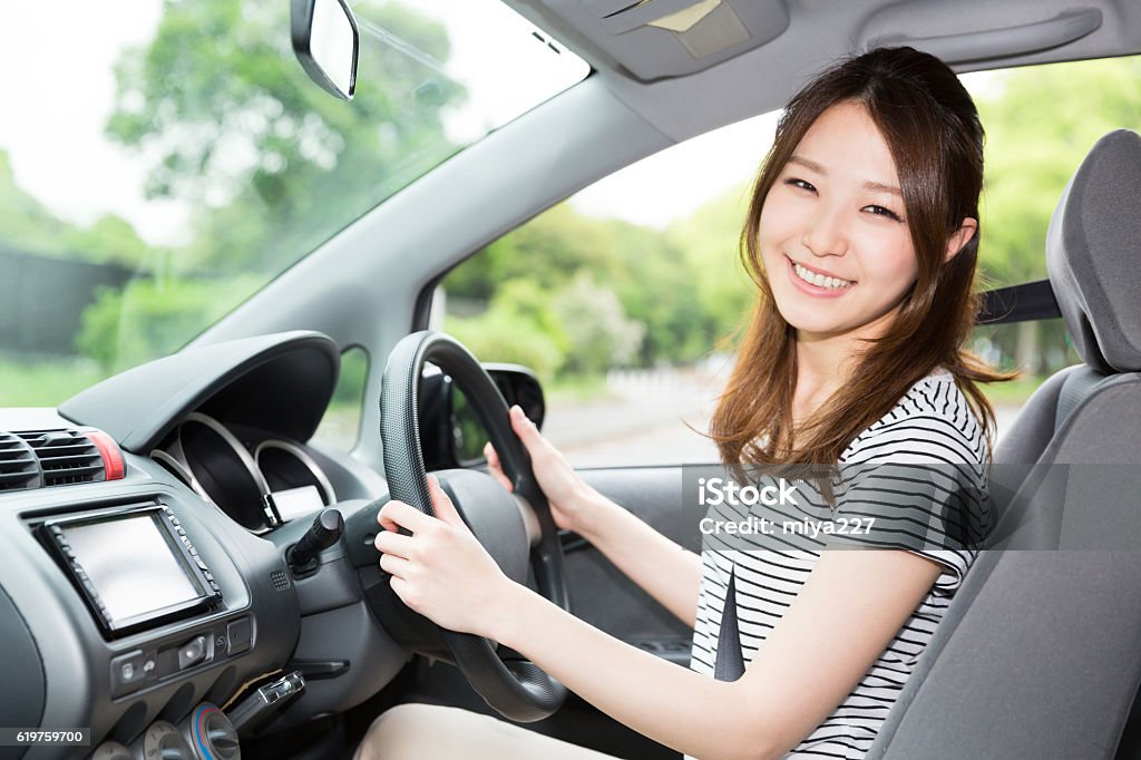Woman driving a car Car Stock Photo