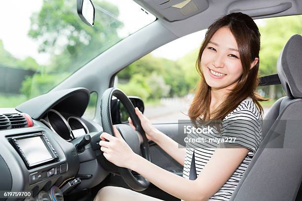 Woman Driving A Car Stock Photo - Download Image Now - Car, Driving, Women