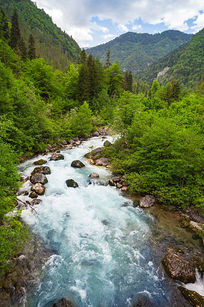 istock Landscape in Abkhazia with Caucasian ridge and river 619759964