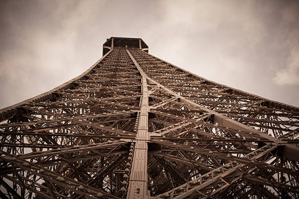istock Tourists on Eiffel Tour in Paris 619760282