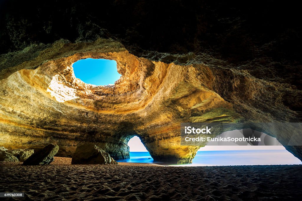 Beautiful natural cave in Benagil, Portugal Beautiful natural cave in Benagil, Algarve, Portugal Cave Stock Photo