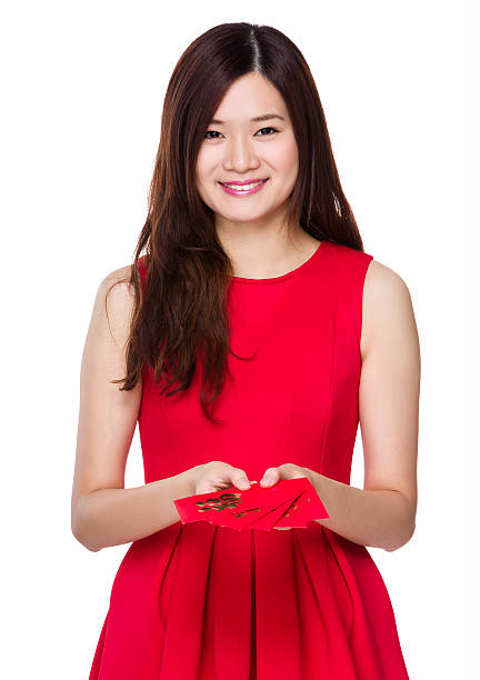 istock Woman holding red envelopes 619760358
