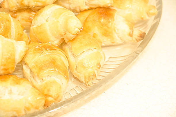 istock Baked homemade croissants on a dish 619762314