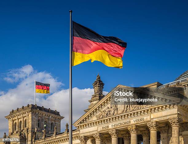 German Flags At Reichstag Berlin Germany Stock Photo - Download Image Now - Germany, German Flag, Flag