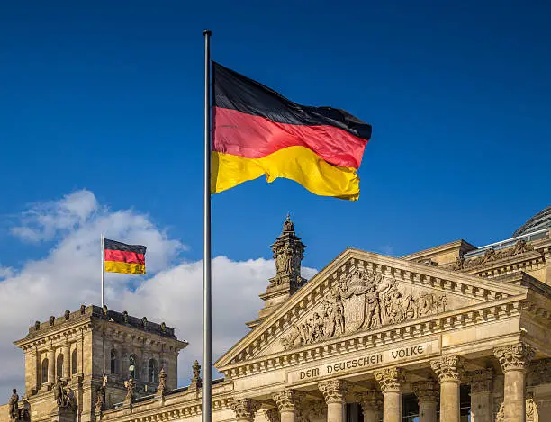 Photo of German flags at Reichstag, Berlin, Germany