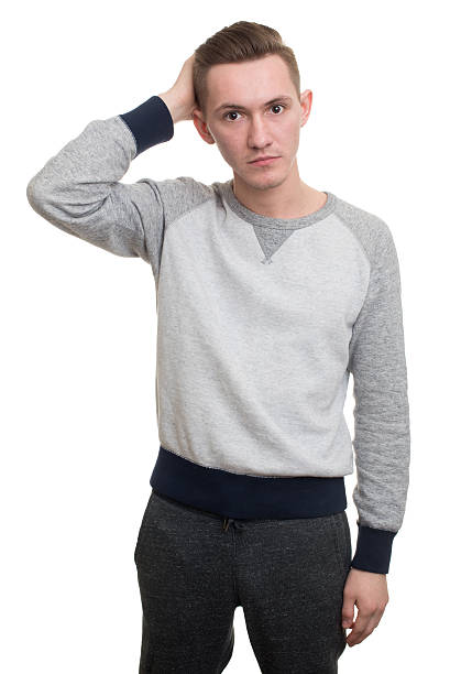 istock Attractive man touching his hair 619763940