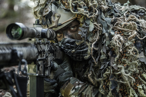 United states army ranger sniper wearing ghillie suit