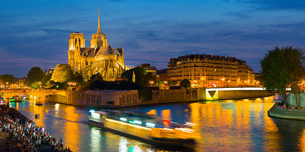 istock View of Notre Dame De Paris at night 619765692