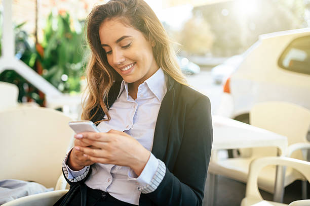 istock Happy businesswoman using phone 619766926