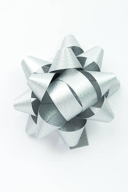 istock Shinny gray gift ribbon bow on white background 619768846