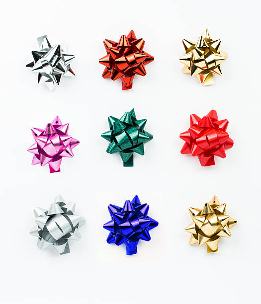 istock Collection of shinny multicolor gift ribbon bow on white background 619769082