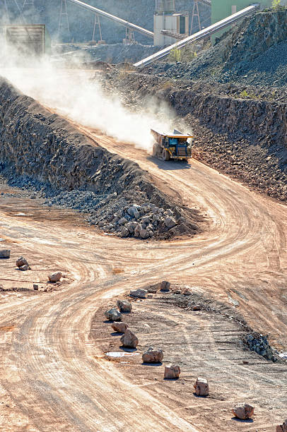 istock dumper truck transport crushed rocks in a quarry. 619769154