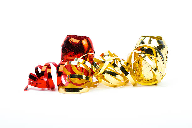 istock Shinny red and gold gift ribbon on white background 619769218