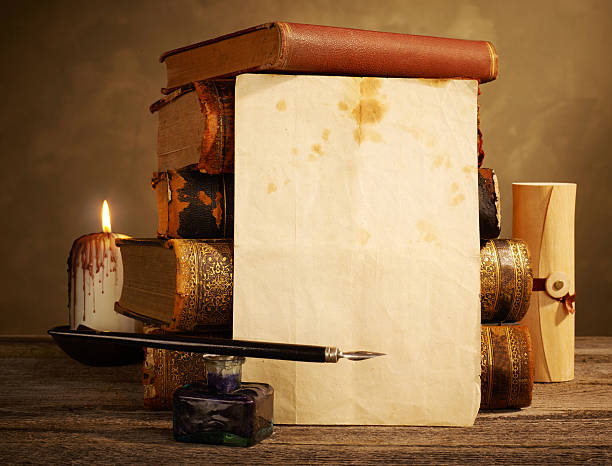 istock Blank antique page and books 619769982