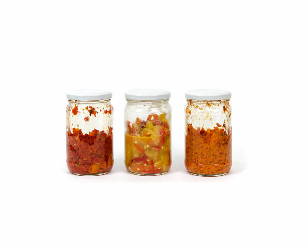 istock half a jar pickles or preserves on a white background 619770006