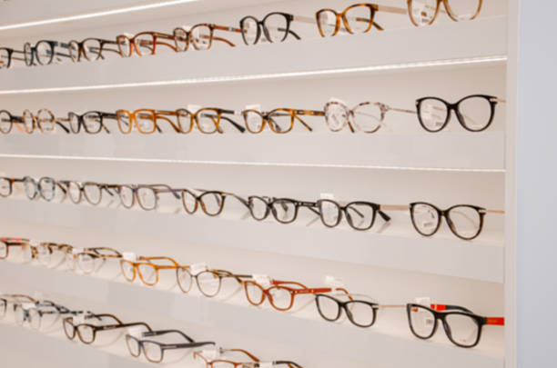 istock shelf with glasses in the shop,soft focus 619771162