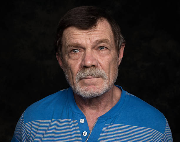 istock Closeup portrait of elderly man 619771312