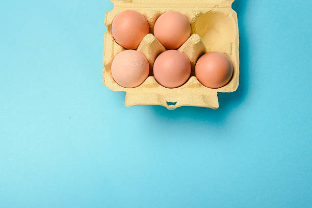 istock View of opened box of chicken eggs 619771362