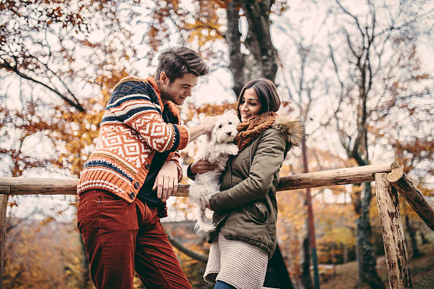 istock Young couple with their pet 619960864