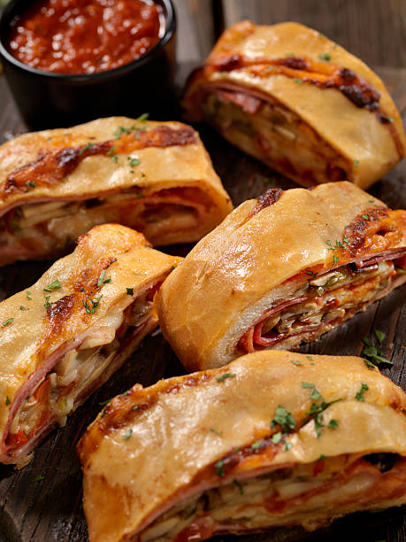 istock Stromboli with Pepperoni, Salami, Mushrooms and Peppers 619962268