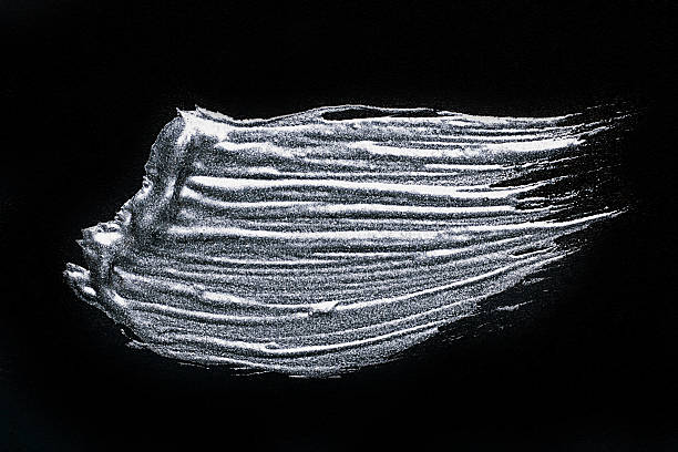 Silver textured painting on black background. Texture of black Silver.