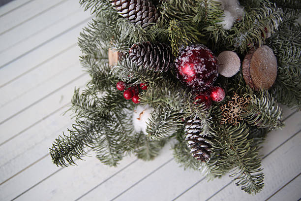 istock Christmas decorations on wooden background 619962544