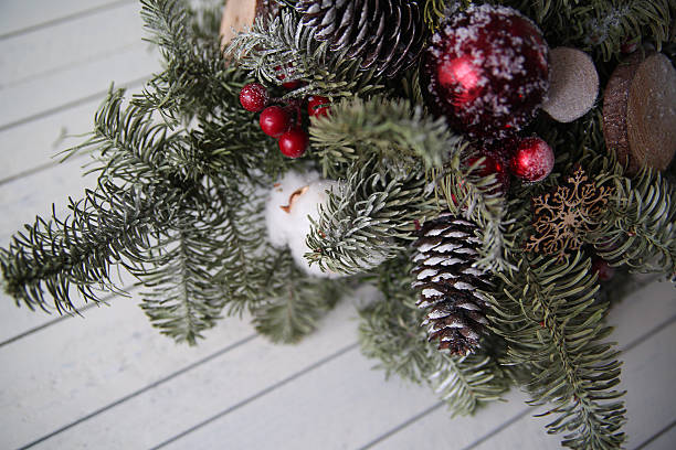 istock Christmas decorations on wooden background 619962728